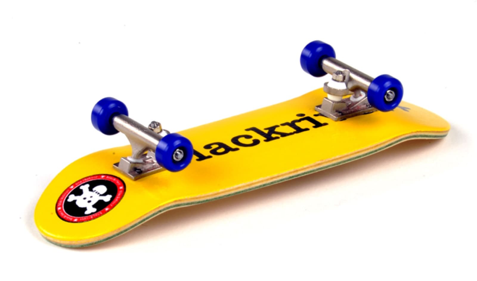 A wooden fingerboard deck photographed as an era reference.