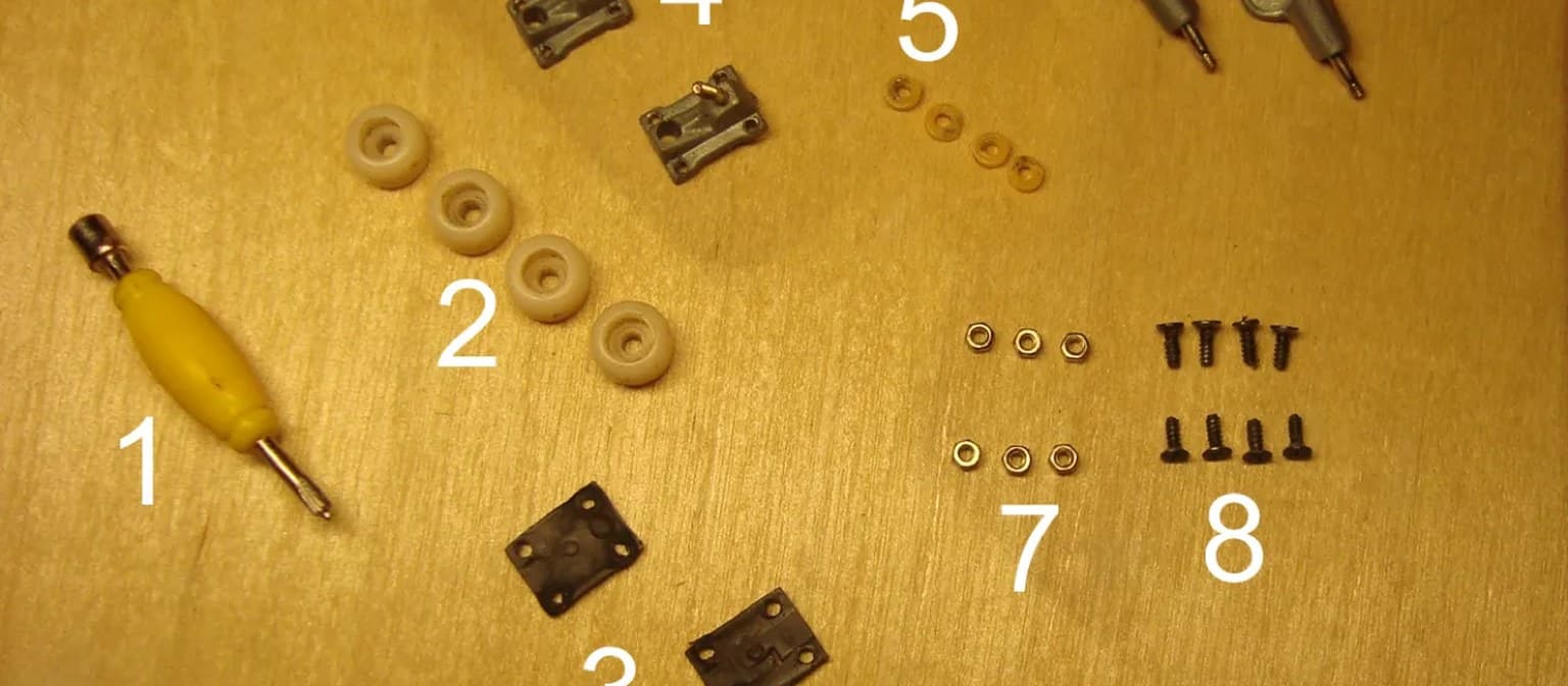 Fingerboard wheels and hardware laid out for inspection.